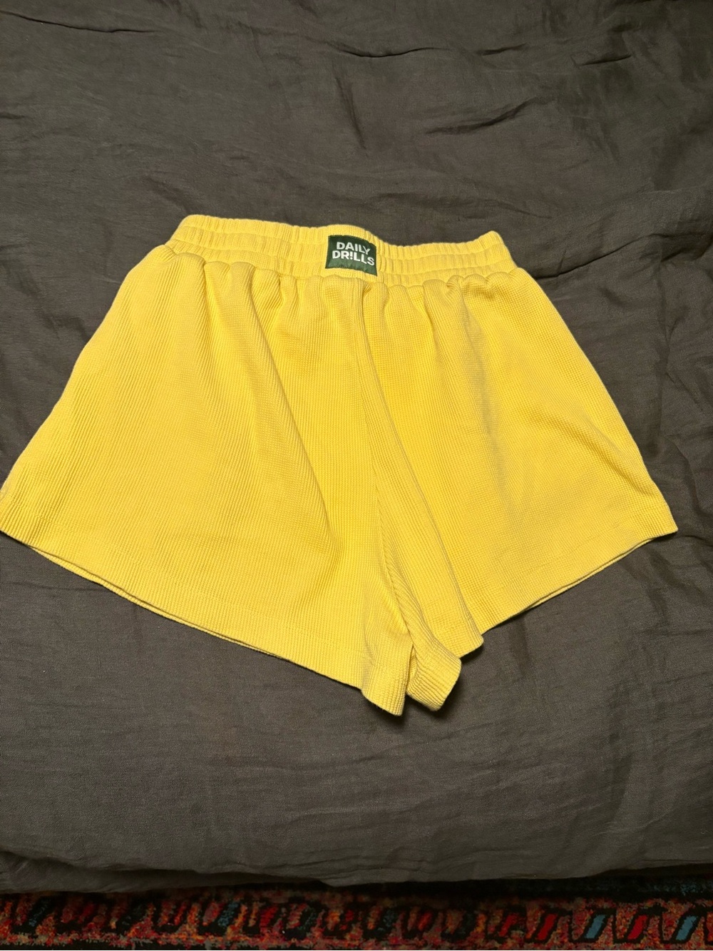 Like new daily drills shorts in sunny yellow